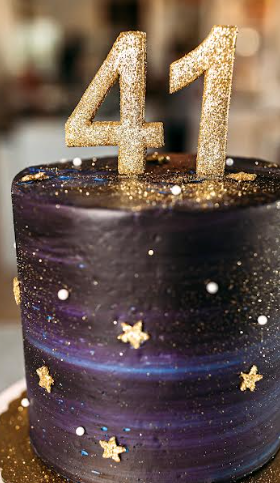 Birthday blue cosmic cake on festive background with text Happy Birthday  Stock Photo - Alamy